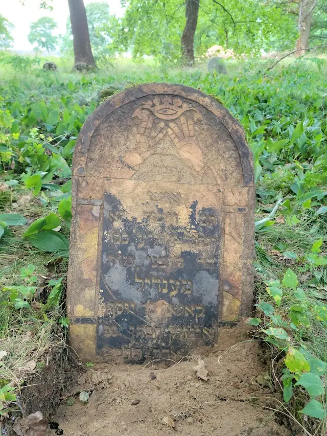 Old Jewish tombstone with carved hands
